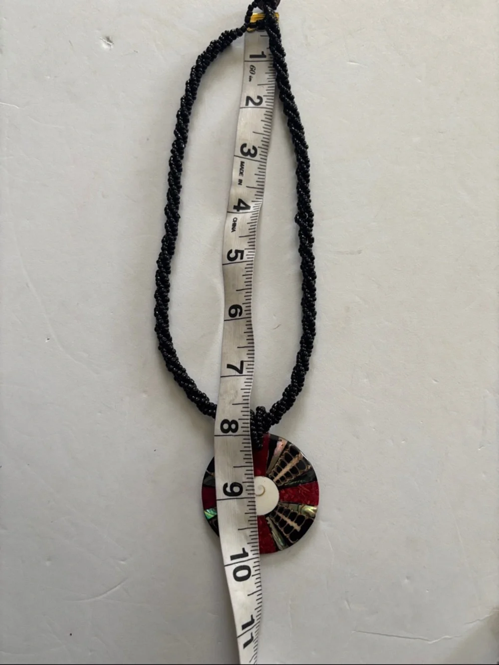 Source Unknown Black Beaded Necklace with Red, Green and Ivory Inlay Pendant